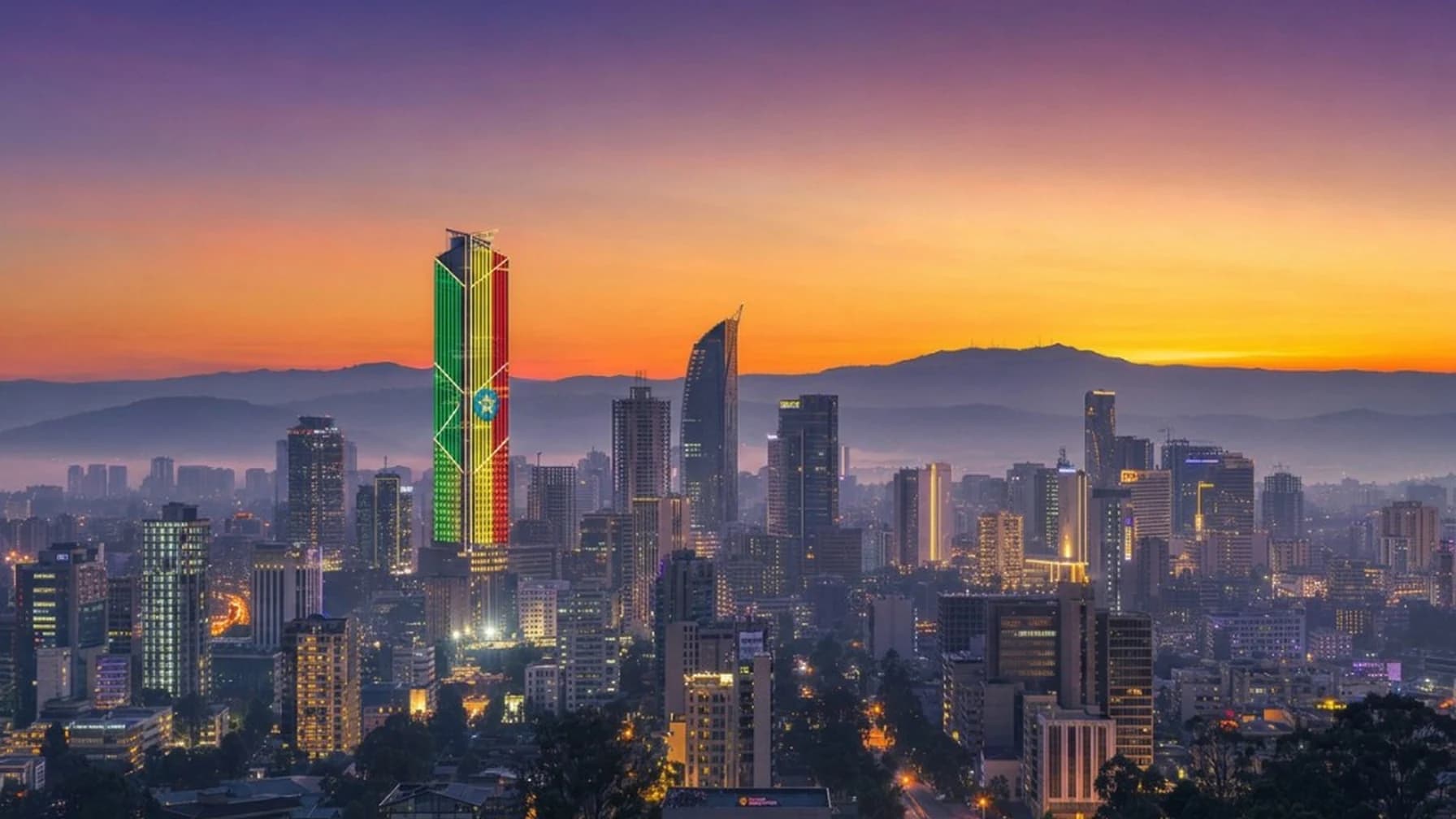 Addis Ababa skyline at dusk with Ethiopian flag lights